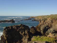 A rugged coastline featuring rocky formations